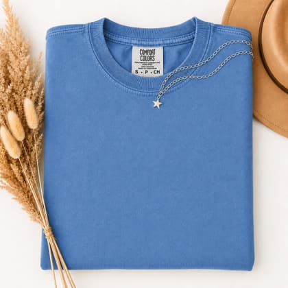Comfort Colors® 1717 — Folded with Props mockup in Royal Caribe
