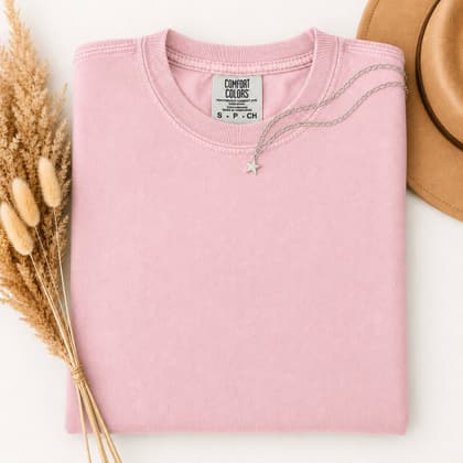 Comfort Colors® 1717 — Folded with Props mockup in Blossom