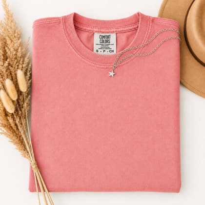 Comfort Colors® 1717 — Folded with Props mockup in Peony