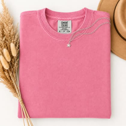 Comfort Colors® 1717 — Folded with Props mockup in Crunchberry