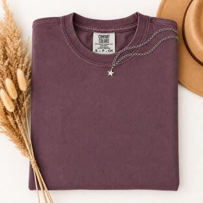 Comfort Colors® 1717 — Folded with Props mockup in Berry