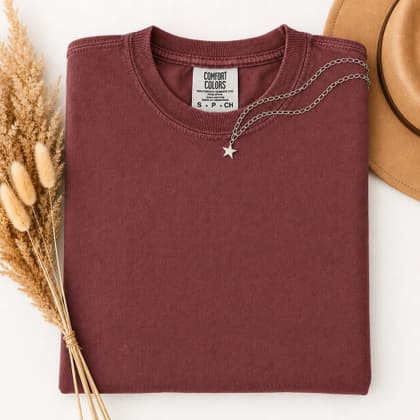 Comfort Colors® 1717 — Folded with Props mockup in Chili