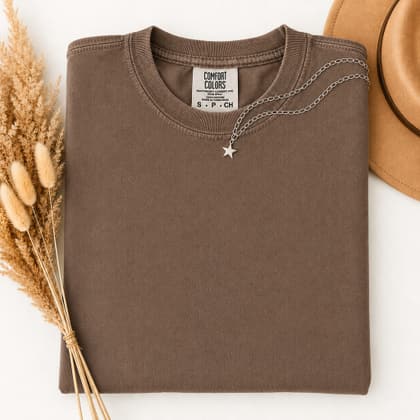 Comfort Colors® 1717 — Folded with Props mockup in Espresso