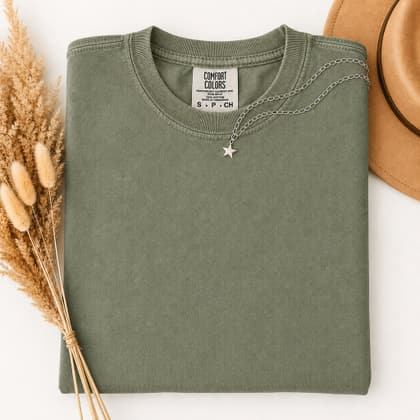Comfort Colors® 1717 — Folded with Props mockup in Sage