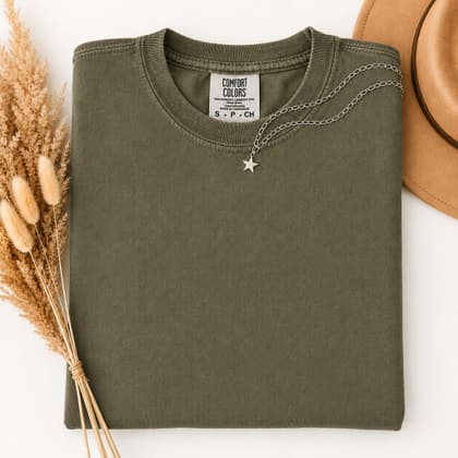 Comfort Colors® 1717 — Folded with Props mockup in Hemp