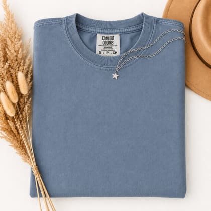 Comfort Colors® 1717 — Folded with Props mockup in Blue Jean