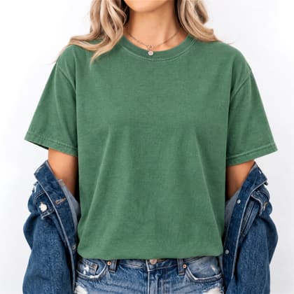 Comfort Colors® 1717 — Worn by a Model mockup in Grass