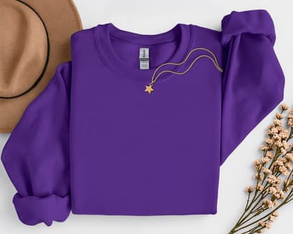 Gildan 18000 Sweatshirt — Folded with Props mockup in Purple
